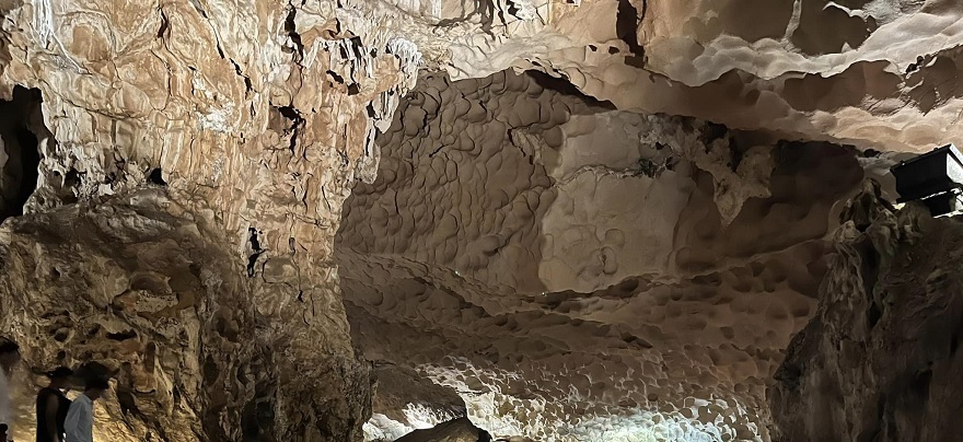 The ceiling of Sung Sot Cave with many smooth and even depressions.